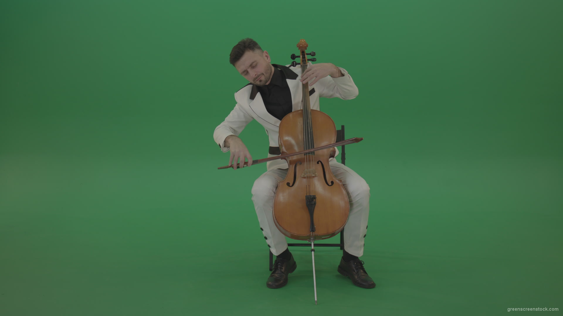 Classic-orchestra-man-in-white-wear-play-violoncello-cello-strings-music-instrument-isolated-on-green-screen_005 Green Screen Stock