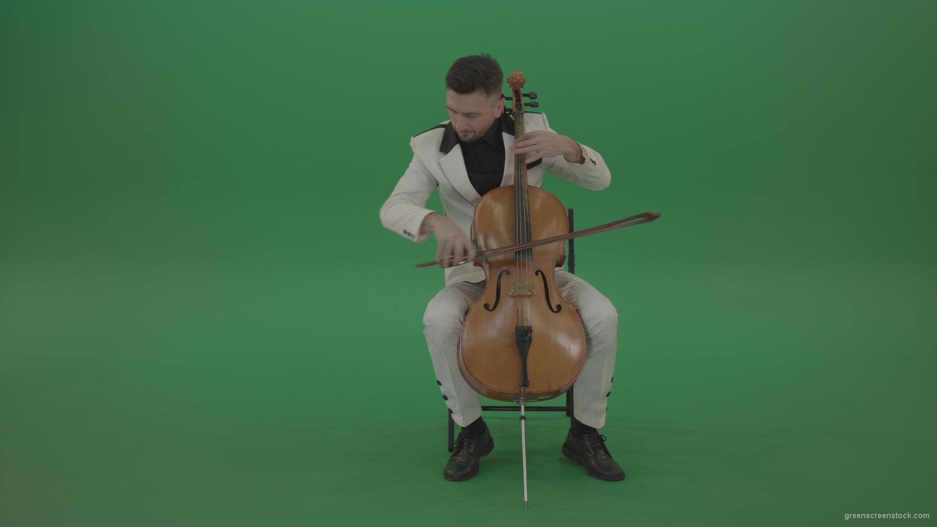 Classic-orchestra-man-in-white-wear-play-violoncello-cello-strings-music-instrument-isolated-on-green-screen_006 Green Screen Stock