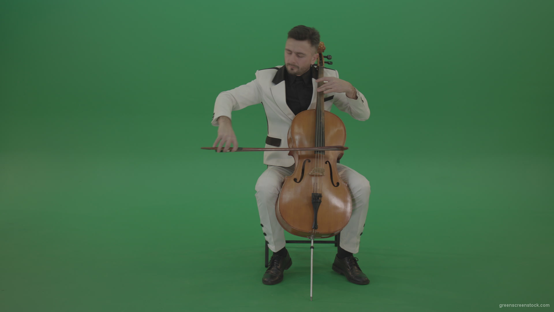 Classic-orchestra-man-in-white-wear-play-violoncello-cello-strings-music-instrument-isolated-on-green-screen_007 Green Screen Stock