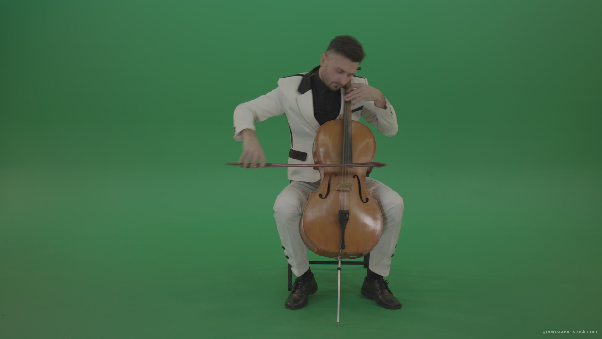 Classic-orchestra-man-in-white-wear-play-violoncello-cello-strings-music-instrument-isolated-on-green-screen_008 Green Screen Stock