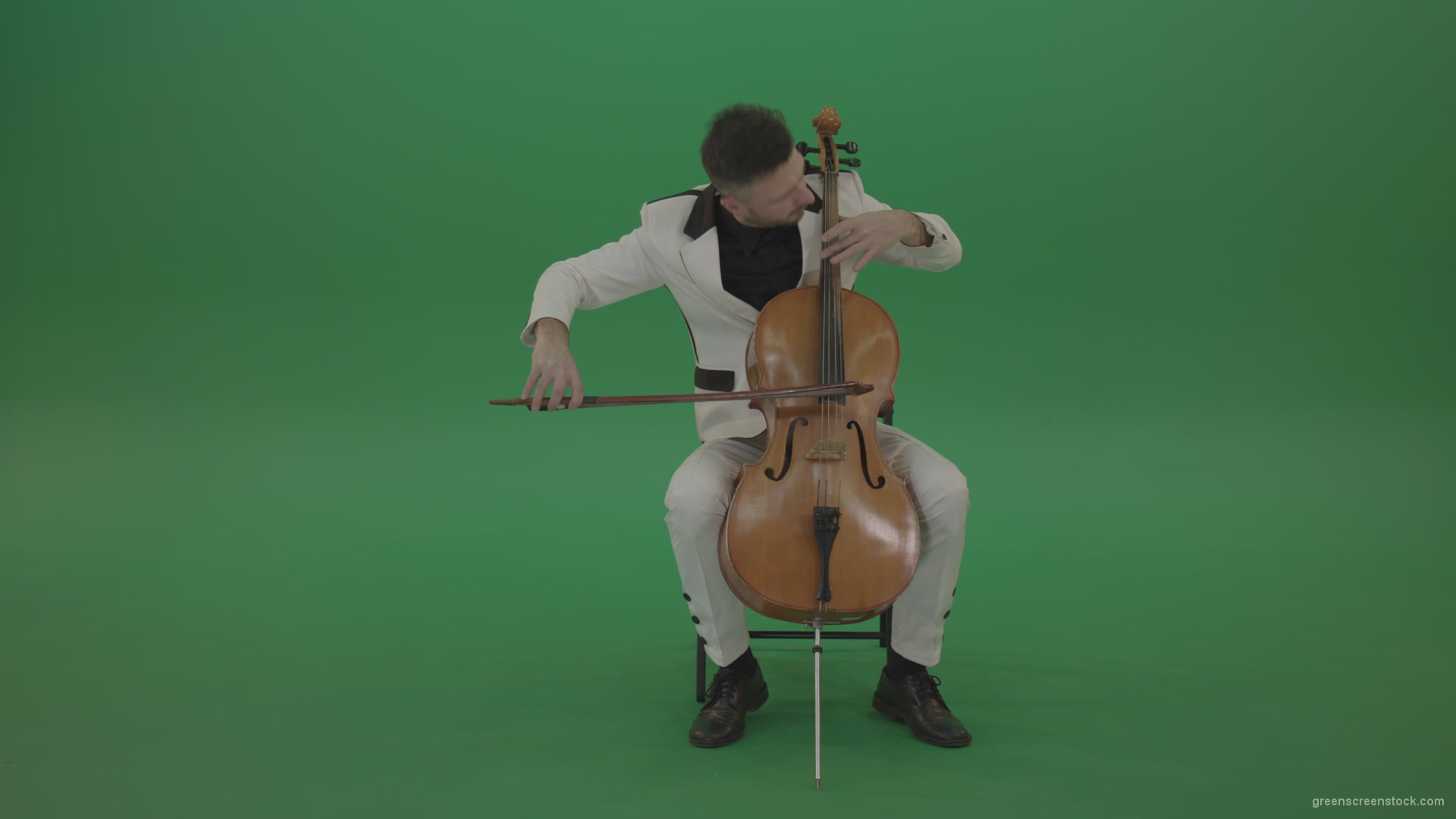 Classic-orchestra-man-in-white-wear-play-violoncello-cello-strings-music-instrument-isolated-on-green-screen_009 Green Screen Stock