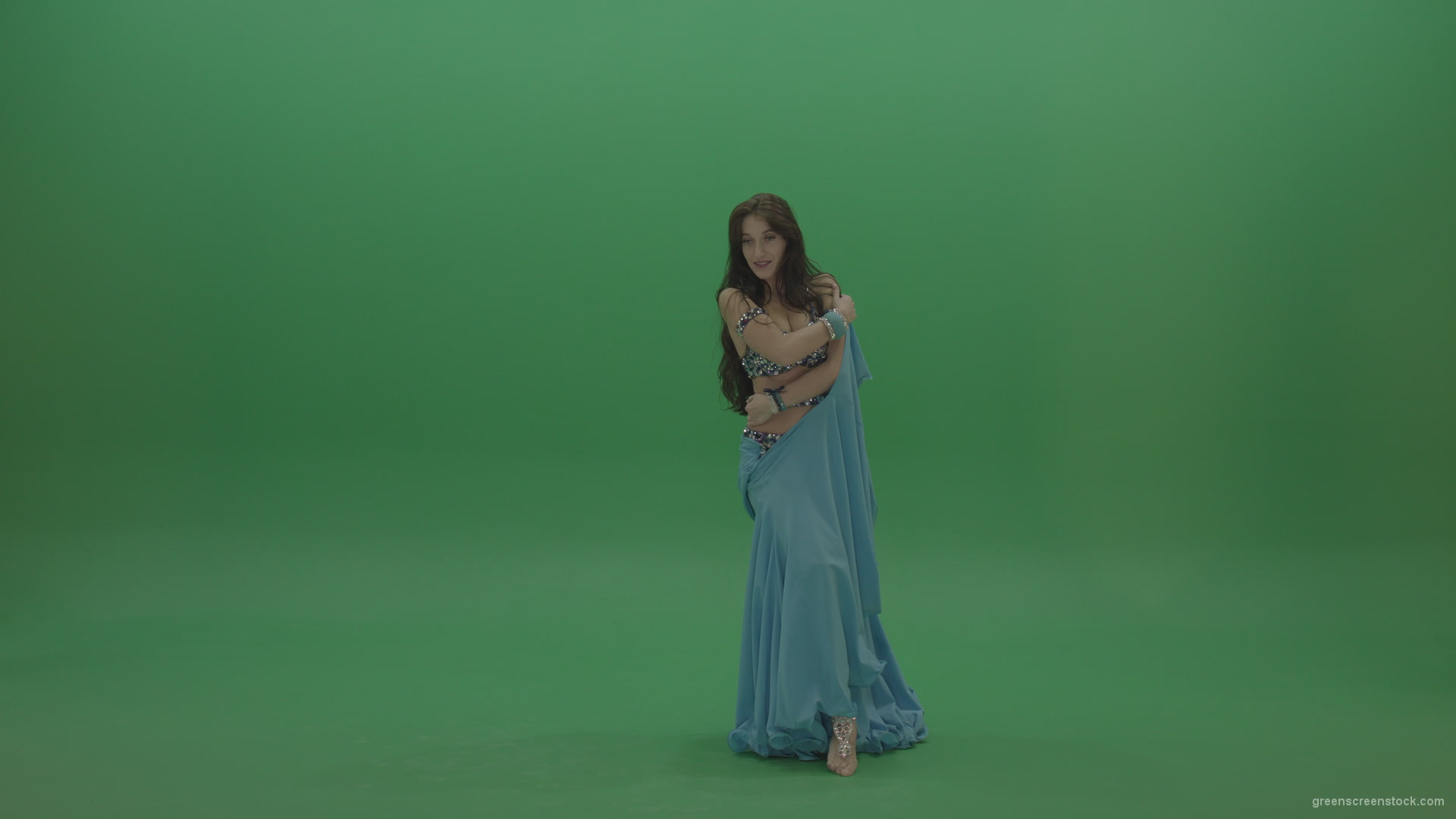 Fair-belly-dancer-in-blue-wear-display-amazing-dance-moves-over-chromakey-background_001 Green Screen Stock