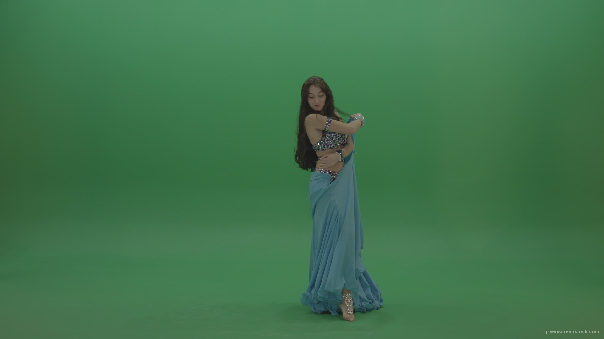 Fair-belly-dancer-in-blue-wear-display-amazing-dance-moves-over-chromakey-background_002 Green Screen Stock