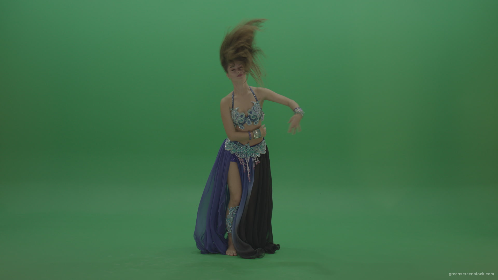 Foxy-belly-dancer-in-purple-and-black-wear-display-amazing-dance-moves-over-chromakey-background_005 Green Screen Stock