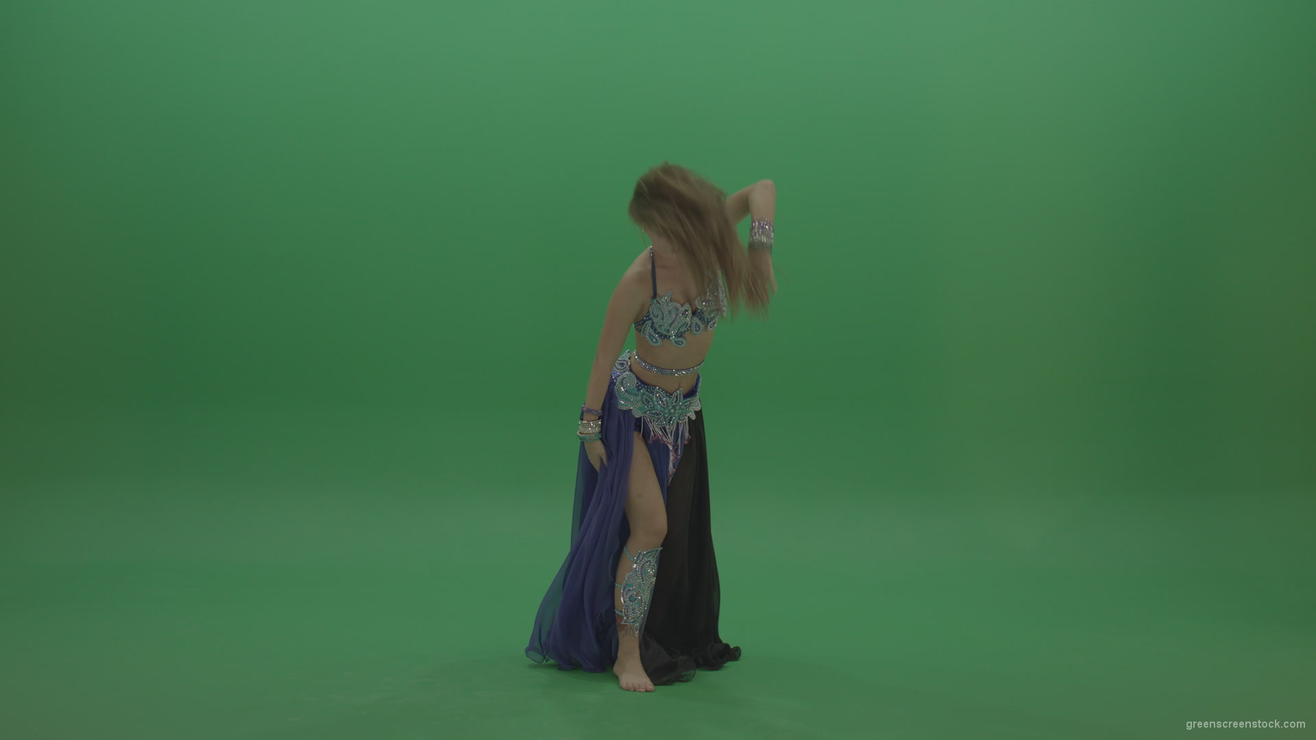 Foxy-belly-dancer-in-purple-and-black-wear-display-amazing-dance-moves-over-chromakey-background_007 Green Screen Stock