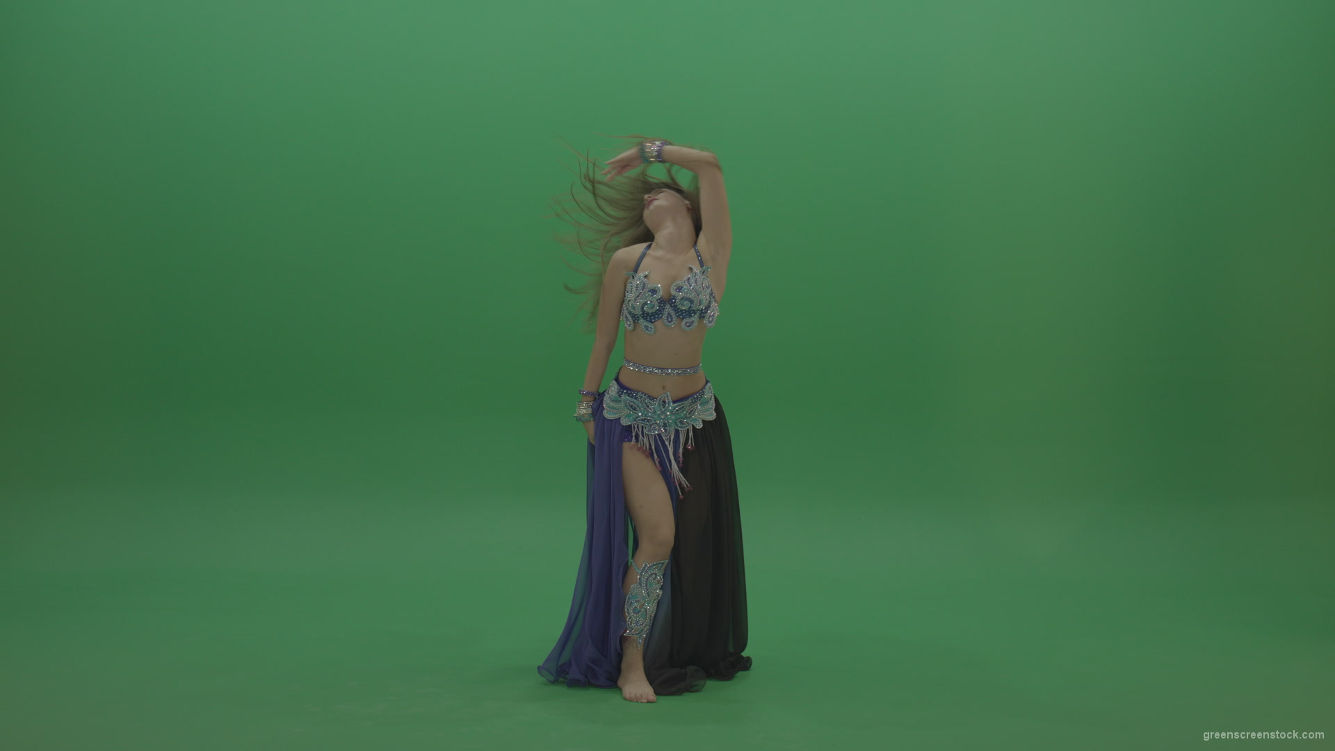 Foxy-belly-dancer-in-purple-and-black-wear-display-amazing-dance-moves-over-chromakey-background_008 Green Screen Stock