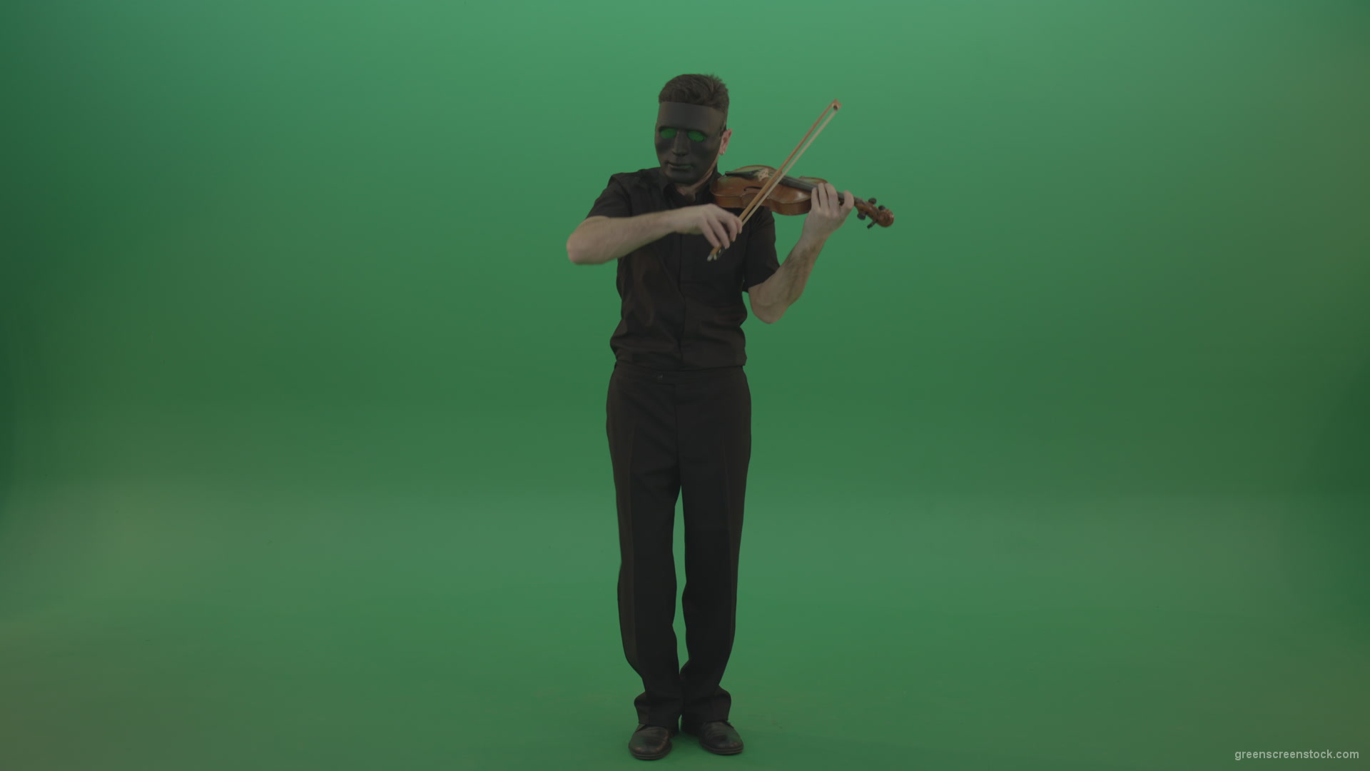 Full-height-Rock-Man-in-black-wear-and-mask-play-violin-fiddle-strings-gothic-dark-music-isolated-on-green-screen_007 Green Screen Stock