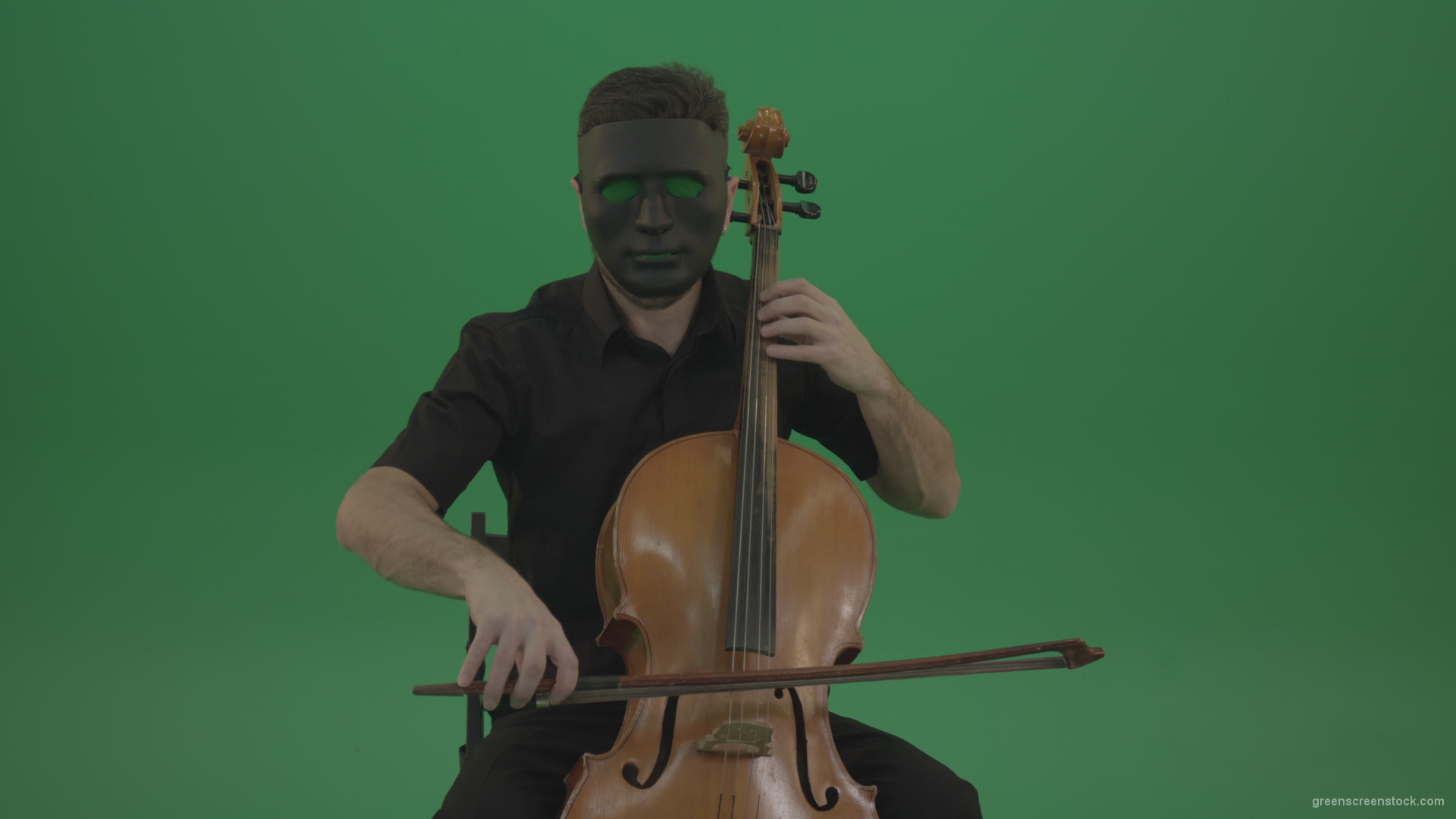 Gothic-Man-in-black-mask-playing-violoncello-cello-strings-music-instrument-isolated-on-green-screen_001 Green Screen Stock