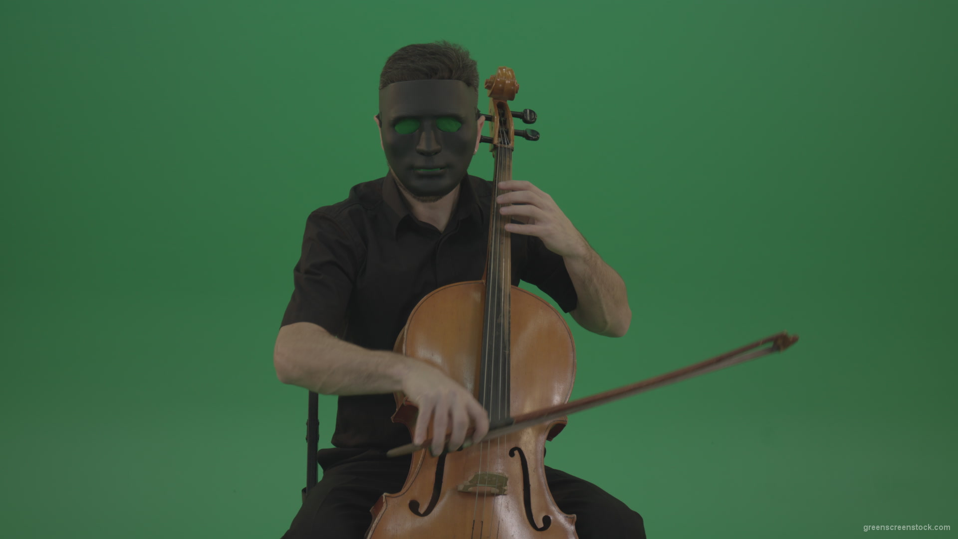 Gothic-Man-in-black-mask-playing-violoncello-cello-strings-music-instrument-isolated-on-green-screen_002 Green Screen Stock
