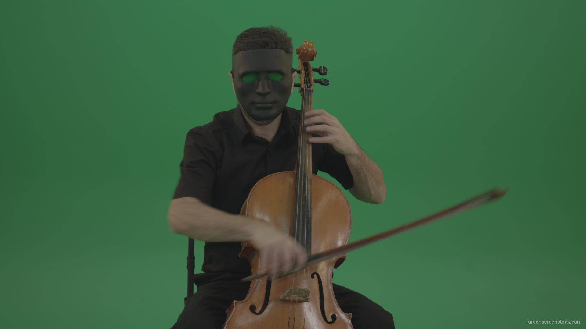 Gothic-Man-in-black-mask-playing-violoncello-cello-strings-music-instrument-isolated-on-green-screen_004 Green Screen Stock
