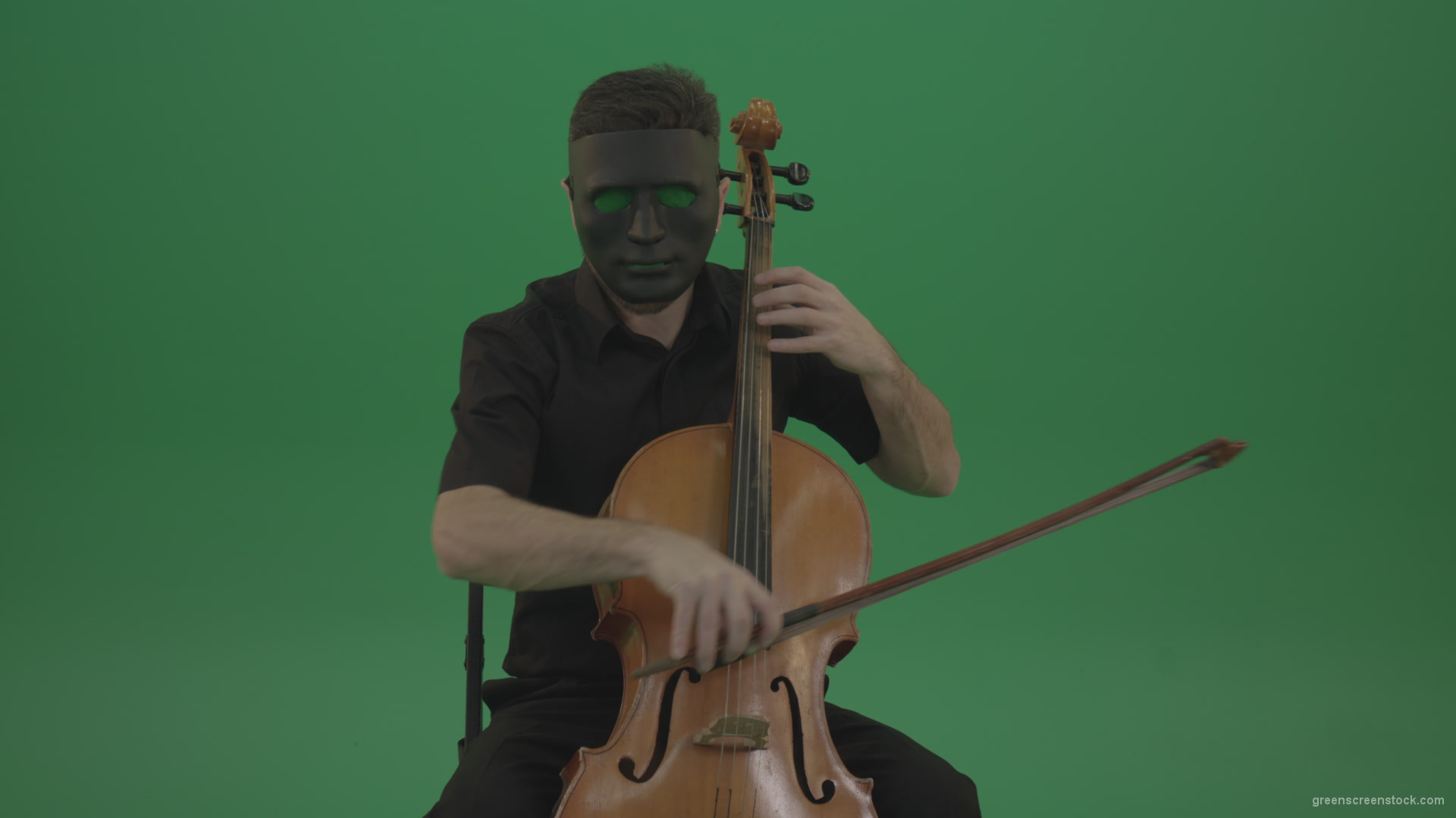 Gothic-Man-in-black-mask-playing-violoncello-cello-strings-music-instrument-isolated-on-green-screen_006 Green Screen Stock