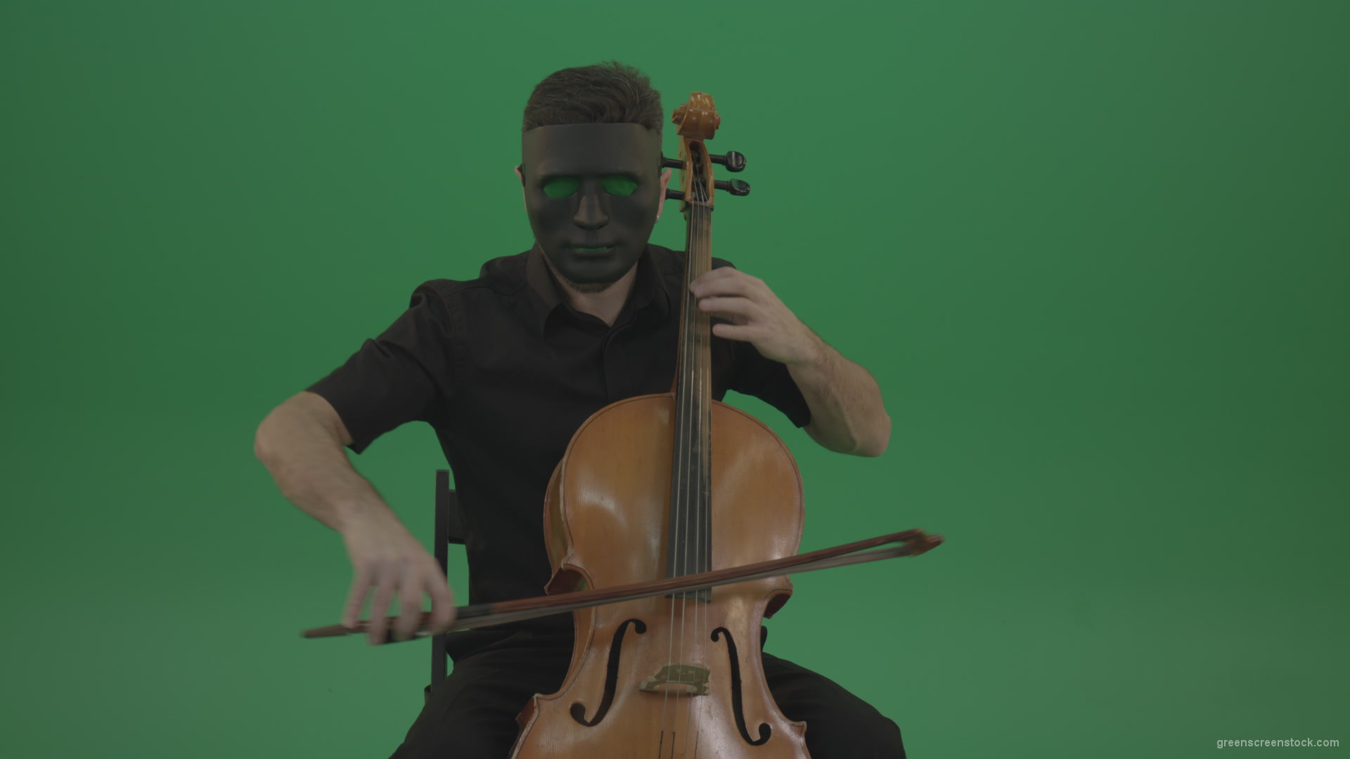 Gothic-Man-in-black-mask-playing-violoncello-cello-strings-music-instrument-isolated-on-green-screen_008 Green Screen Stock