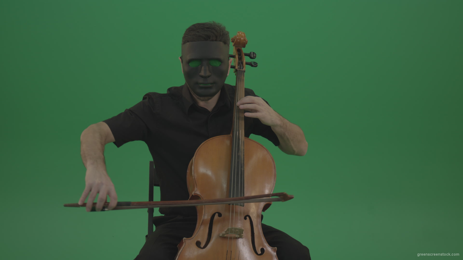 Gothic-Man-in-black-mask-playing-violoncello-cello-strings-music-instrument-isolated-on-green-screen_009 Green Screen Stock