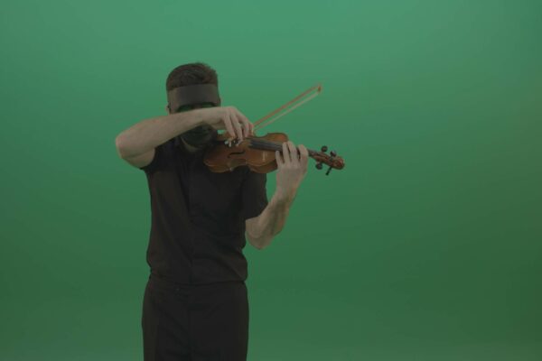 cello vello music player in black costume on green screen