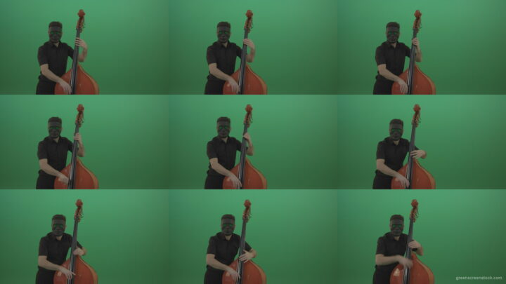 Man-in-black-mask-with-green-eyes-play-music-on-double-bass-instrument-isolated-on-green-screen Green Screen Stock