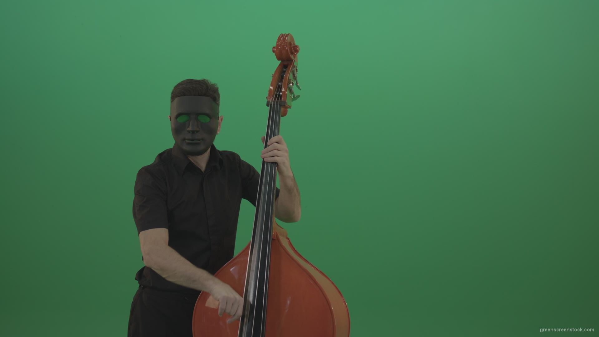 Man-in-black-mask-with-green-eyes-play-music-on-double-bass-instrument-isolated-on-green-screen_004 Green Screen Stock