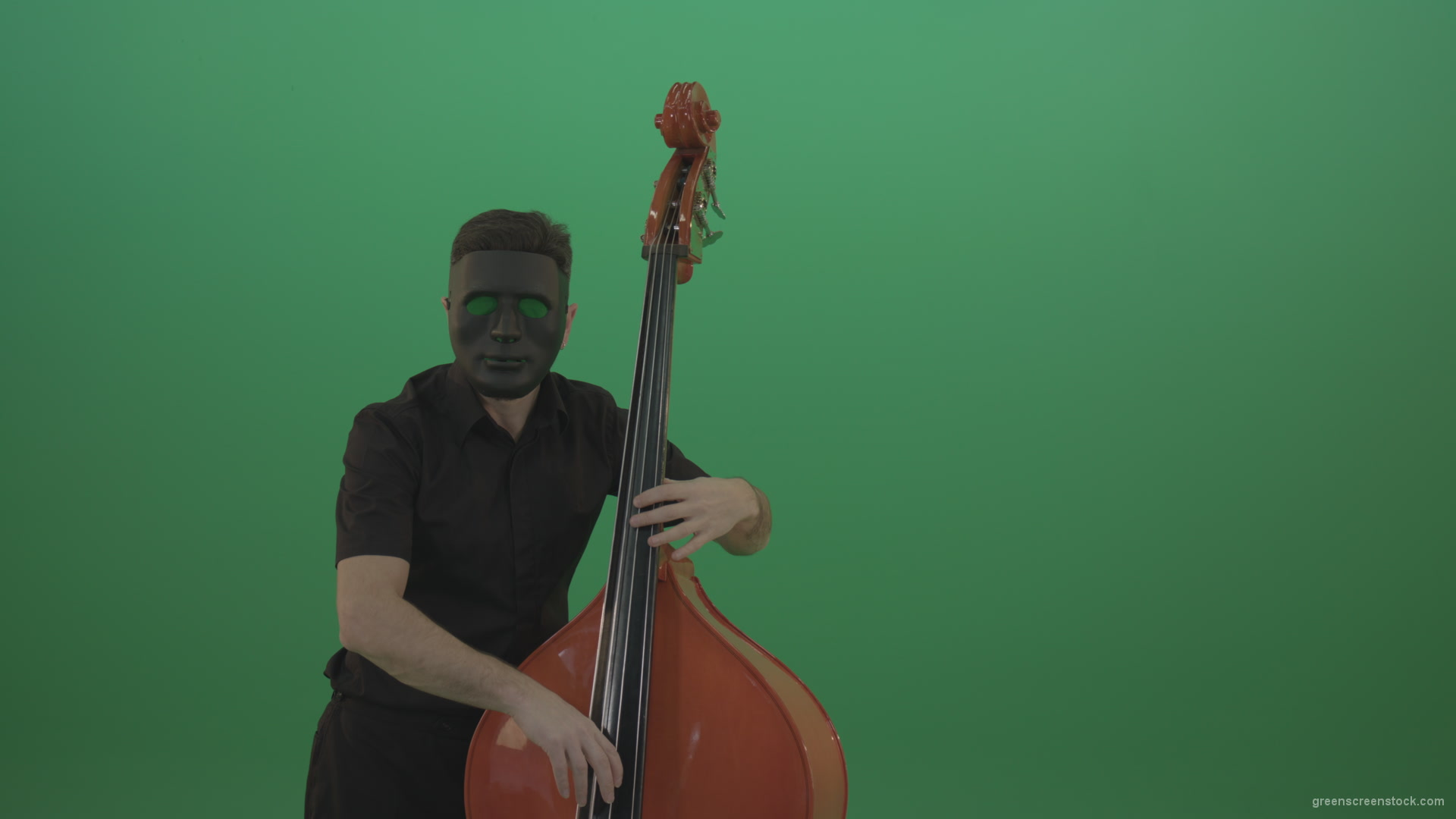 Man-in-black-mask-with-green-eyes-play-music-on-double-bass-instrument-isolated-on-green-screen_006 Green Screen Stock