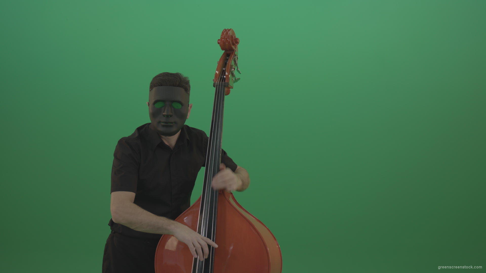 Man-in-black-mask-with-green-eyes-play-music-on-double-bass-instrument-isolated-on-green-screen_007 Green Screen Stock