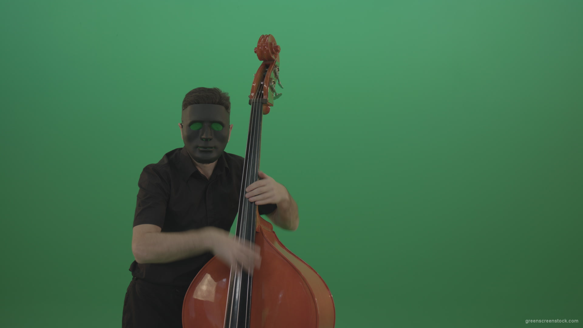 Man-in-black-mask-with-green-eyes-play-music-on-double-bass-instrument-isolated-on-green-screen_009 Green Screen Stock