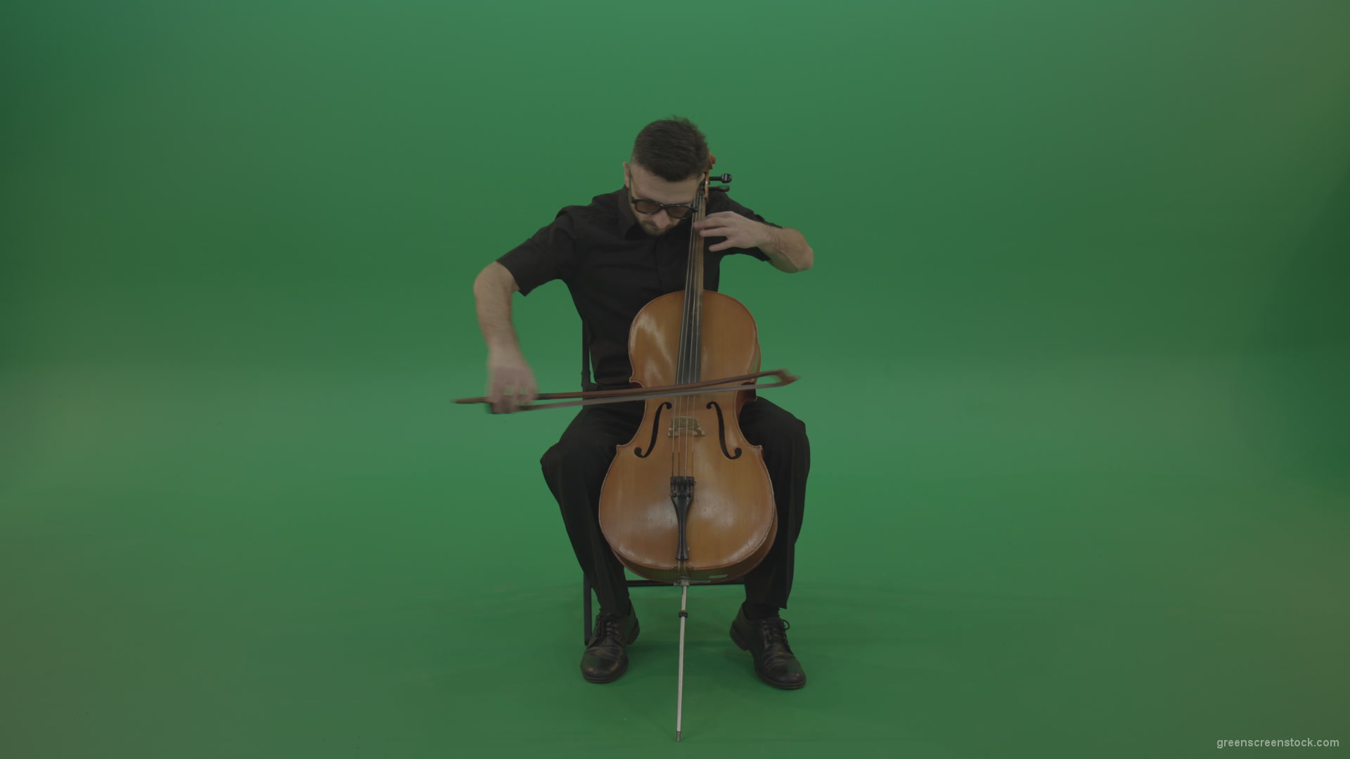 Man-in-black-playing-fast-violoncello-cello-strings-music-instrument-isolated-on-green-screen_006 Green Screen Stock