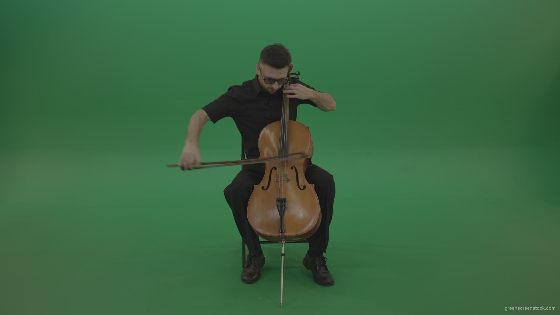 Man-in-black-playing-fast-violoncello-cello-strings-music-instrument-isolated-on-green-screen_007 Green Screen Stock