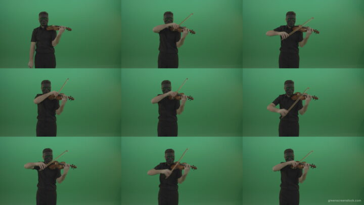 Man-in-black-shirt-and-mask-fast-play-violin-fiddle-strings-gothic-music-isolated-on-green-screen Green Screen Stock