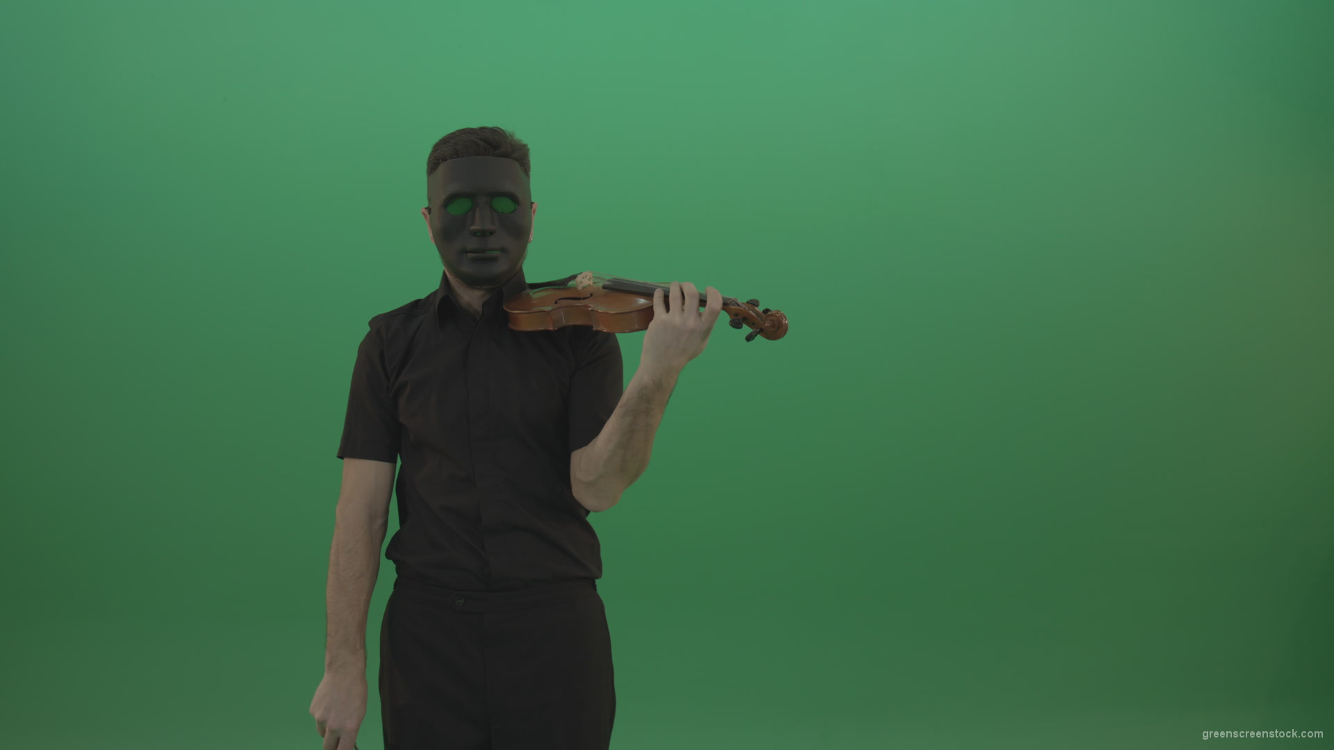 Man-in-black-shirt-and-mask-fast-play-violin-fiddle-strings-gothic-music-isolated-on-green-screen_001 Green Screen Stock