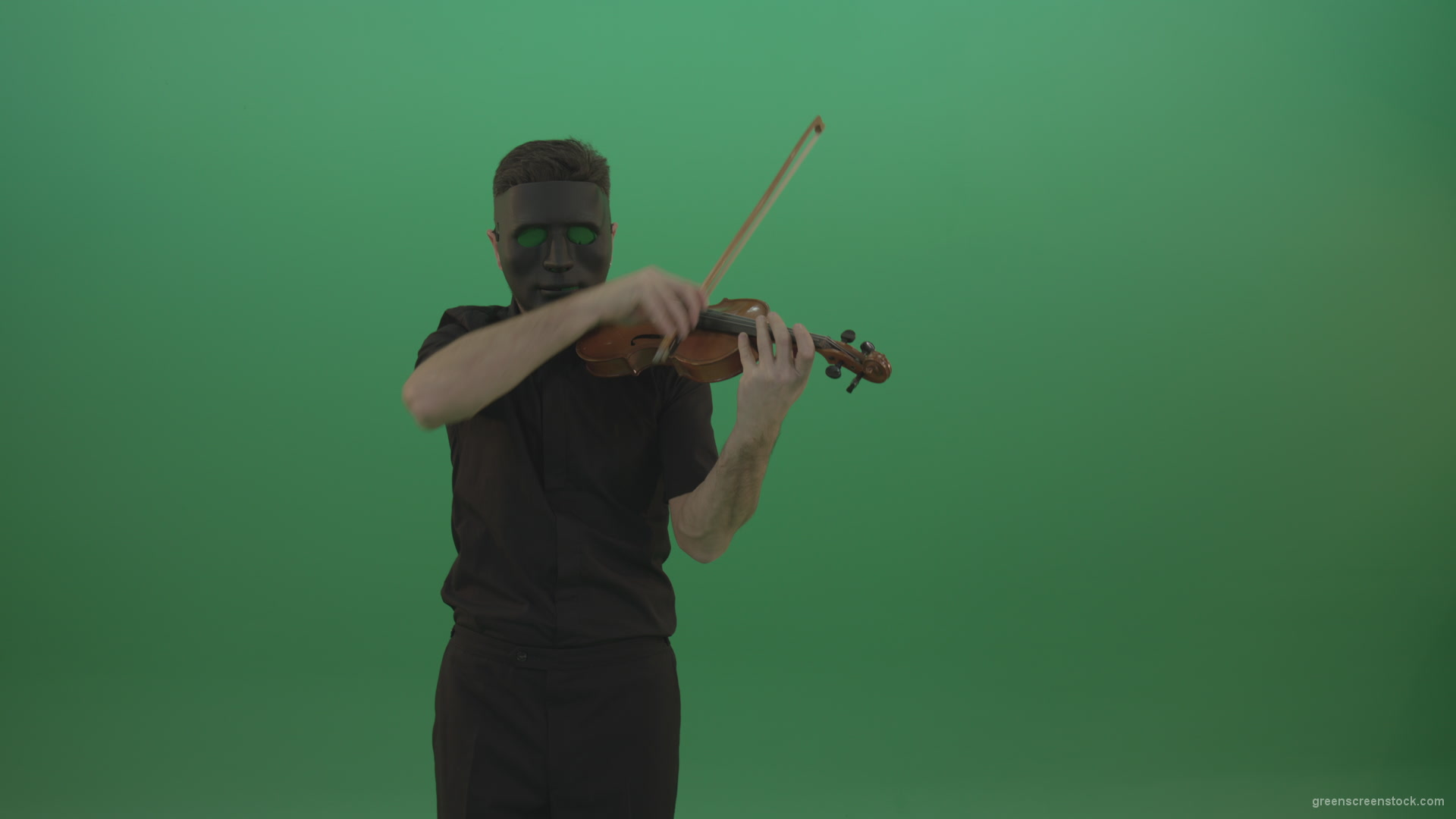 Man-in-black-shirt-and-mask-fast-play-violin-fiddle-strings-gothic-music-isolated-on-green-screen_004 Green Screen Stock