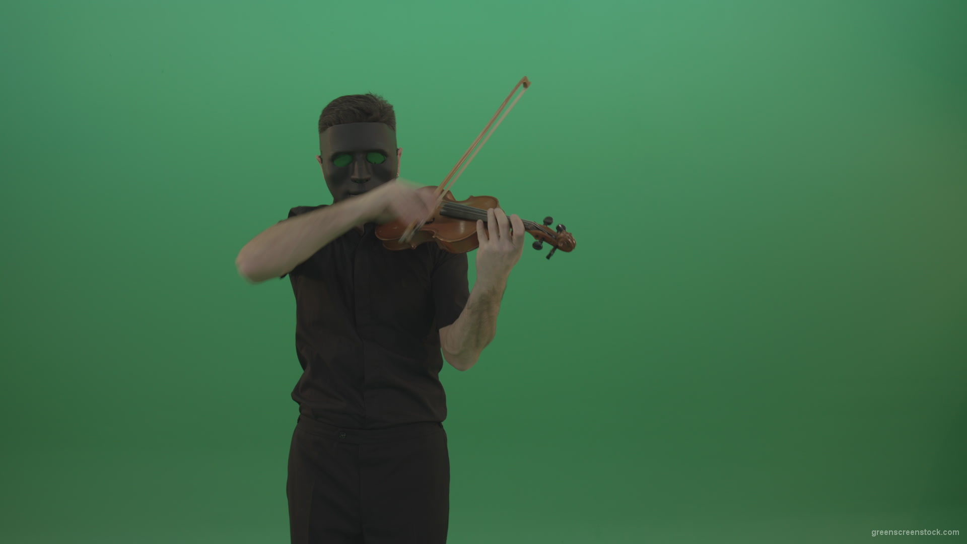 Man-in-black-shirt-and-mask-fast-play-violin-fiddle-strings-gothic-music-isolated-on-green-screen_005 Green Screen Stock