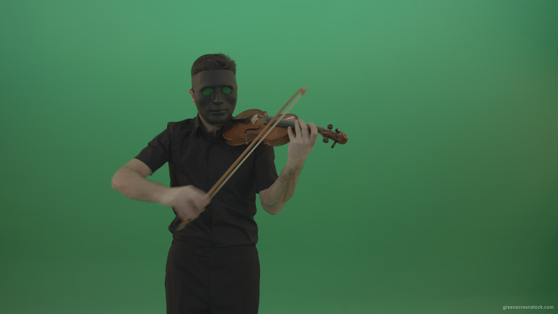 Man-in-black-shirt-and-mask-fast-play-violin-fiddle-strings-gothic-music-isolated-on-green-screen_006 Green Screen Stock