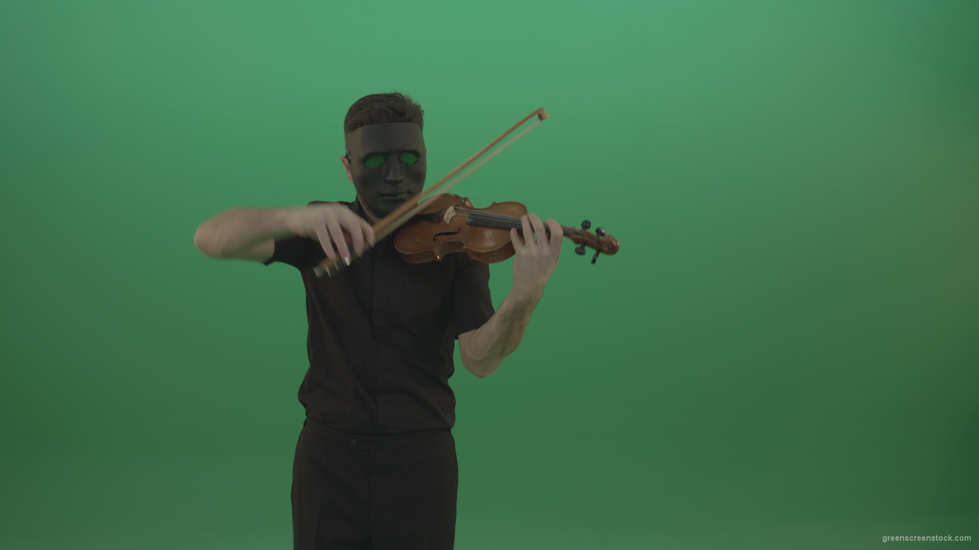Man-in-black-shirt-and-mask-fast-play-violin-fiddle-strings-gothic-music-isolated-on-green-screen_007 Green Screen Stock