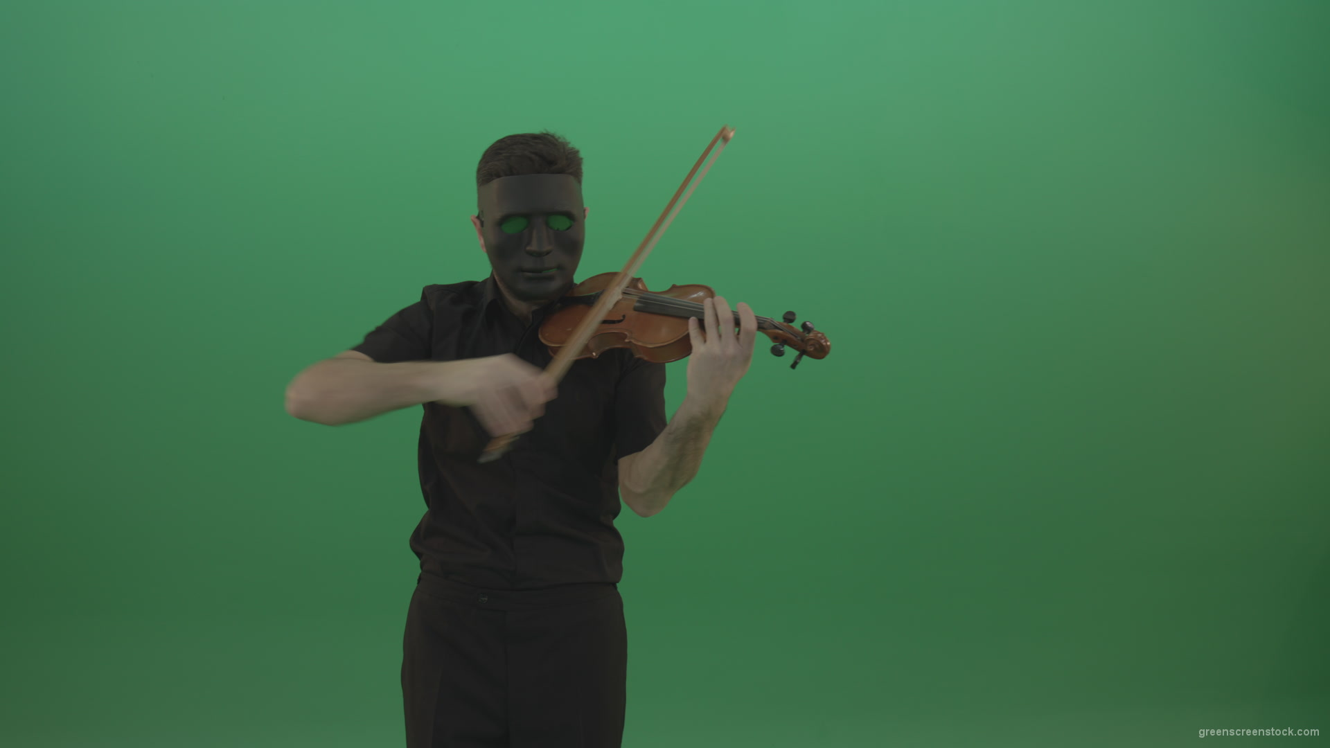 Man-in-black-shirt-and-mask-fast-play-violin-fiddle-strings-gothic-music-isolated-on-green-screen_008 Green Screen Stock