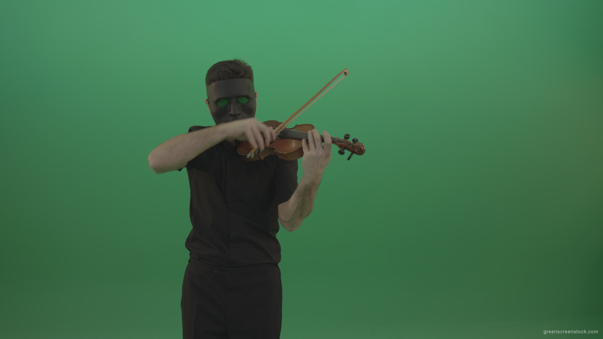 Man-in-black-shirt-and-mask-fast-play-violin-fiddle-strings-gothic-music-isolated-on-green-screen_009 Green Screen Stock