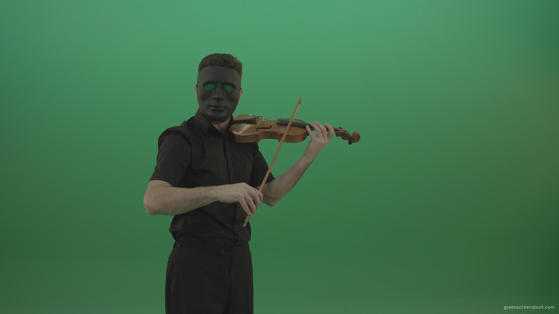 Man-in-black-wear-and-mask-play-violin-fiddle-strings-gothic-dark-music-isolated-on-green-screen_001 Green Screen Stock