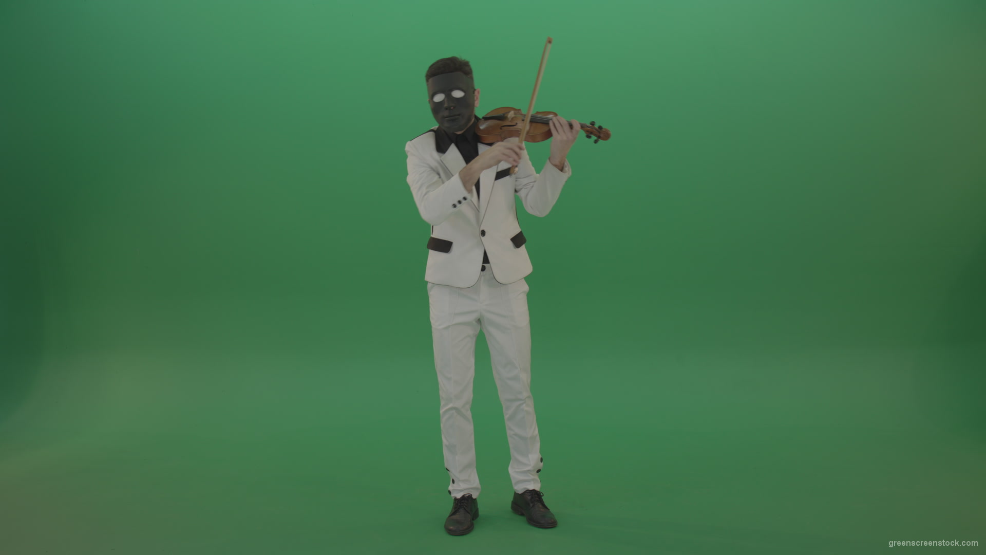 Man-in-white-costume-and-eyes-in-black-mask-play-gothic-violin-Fiddle-string-music-instrument-isolated-on-green-screen_006 Green Screen Stock