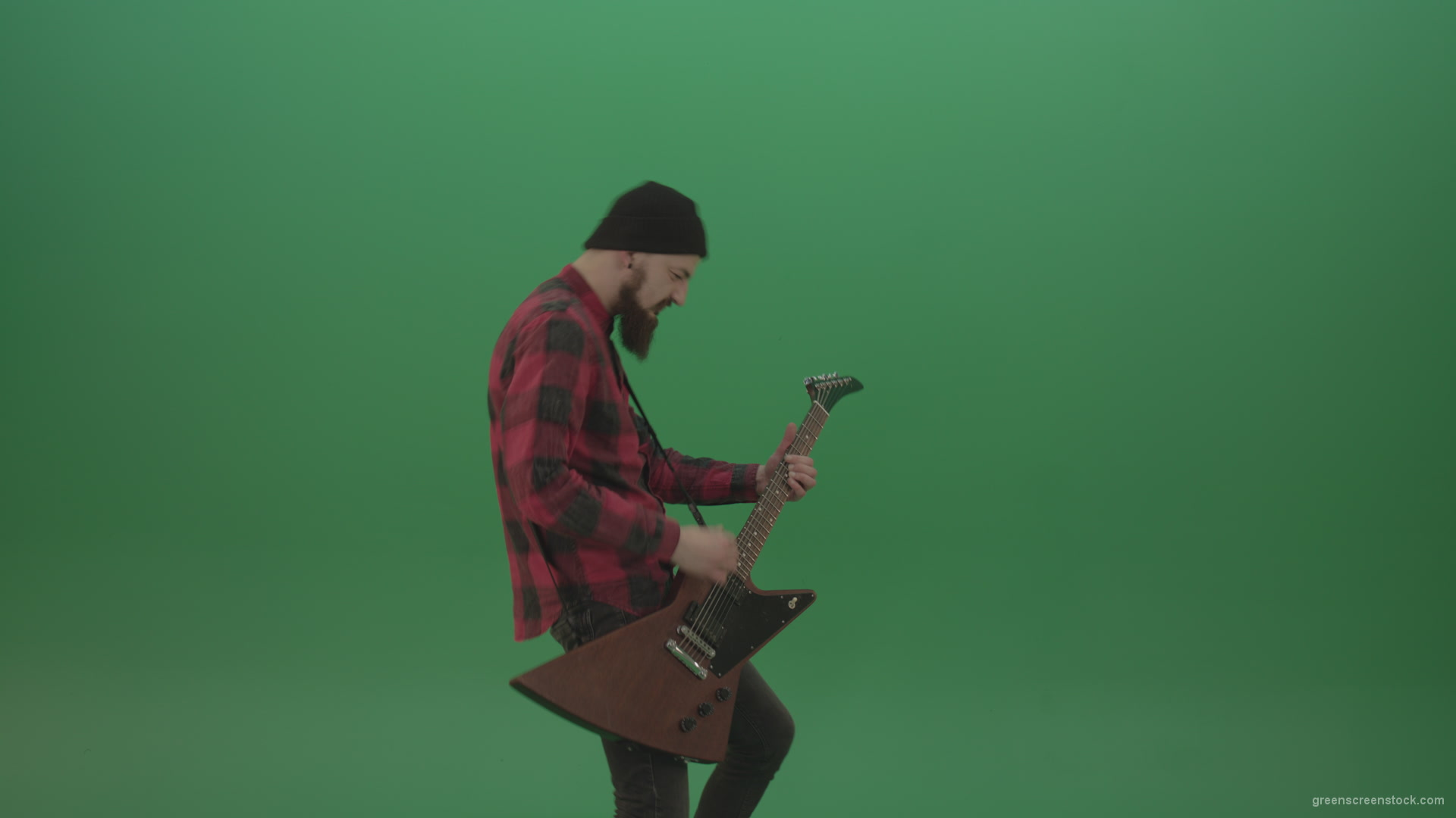 Man-punk-hardrock-guitarist-playing-guitar-in-side-view-in-green-screen-studio_006 Green Screen Stock
