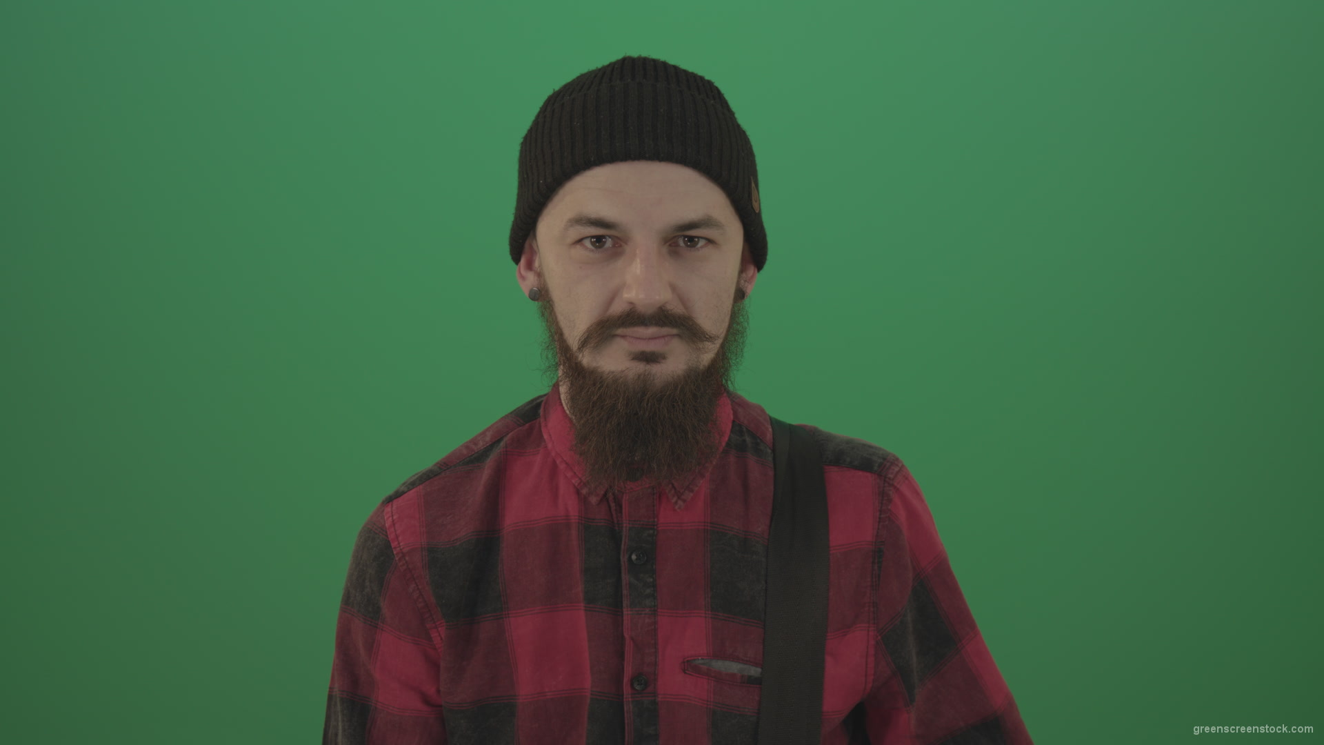 Punk-rocker-man-with-beard-and-red-shirt-screaming-feels-pain-isolated-on-green-screen-background_001 Green Screen Stock