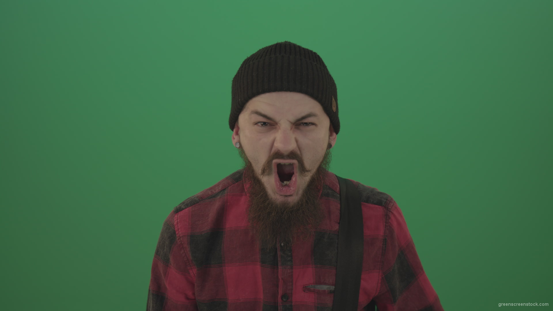Punk-rocker-man-with-beard-and-red-shirt-screaming-feels-pain-isolated-on-green-screen-background_005 Green Screen Stock