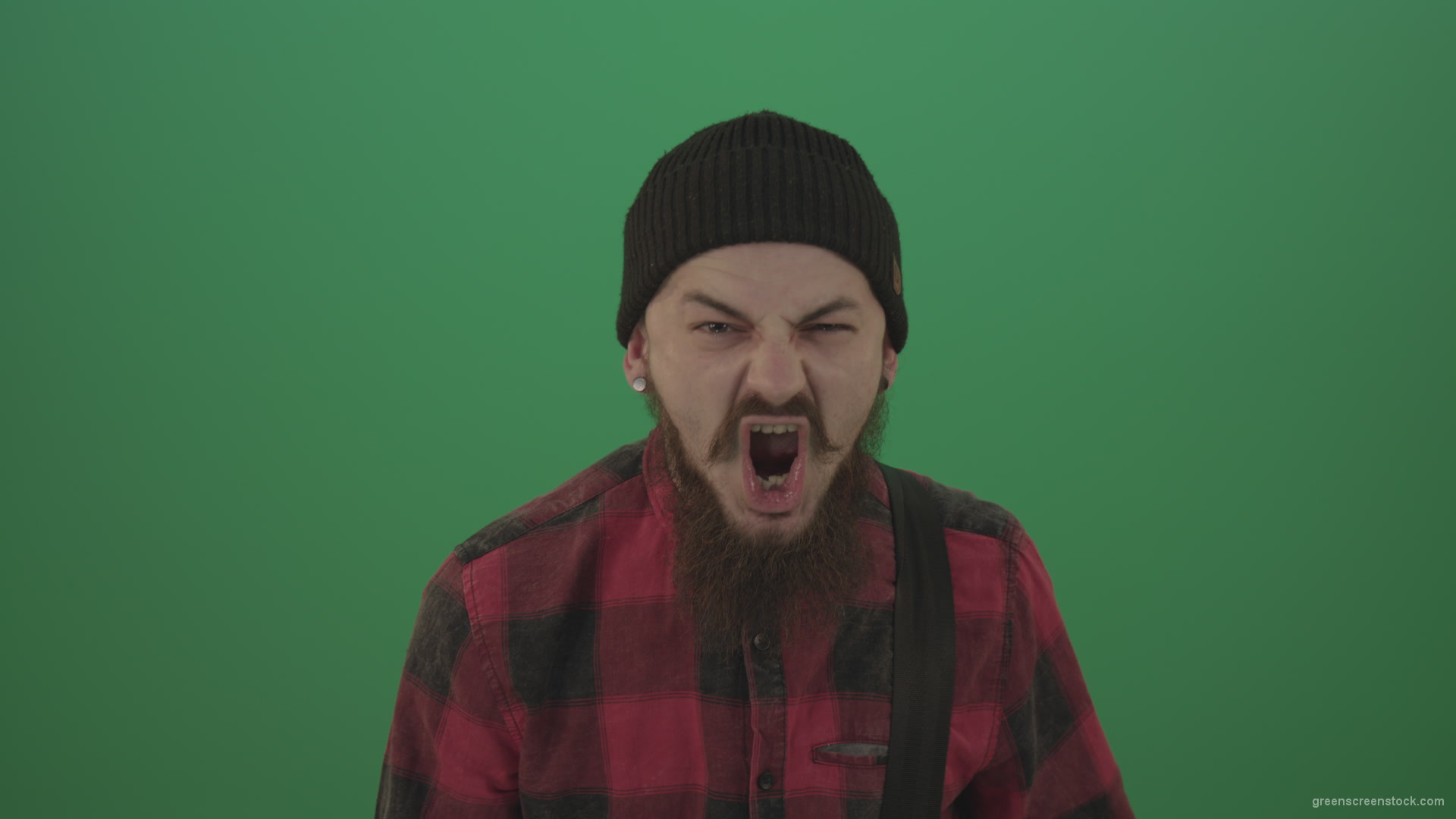 Punk-rocker-man-with-beard-and-red-shirt-screaming-feels-pain-isolated-on-green-screen-background_007 Green Screen Stock