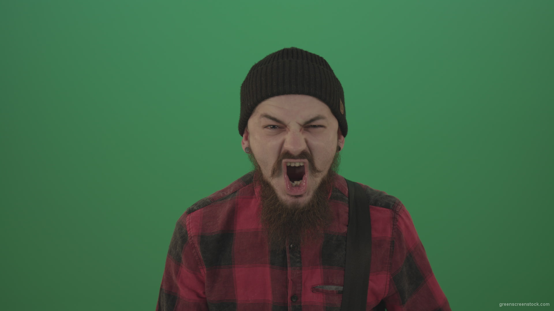 Punk-rocker-man-with-beard-and-red-shirt-screaming-feels-pain-isolated-on-green-screen-background_009 Green Screen Stock
