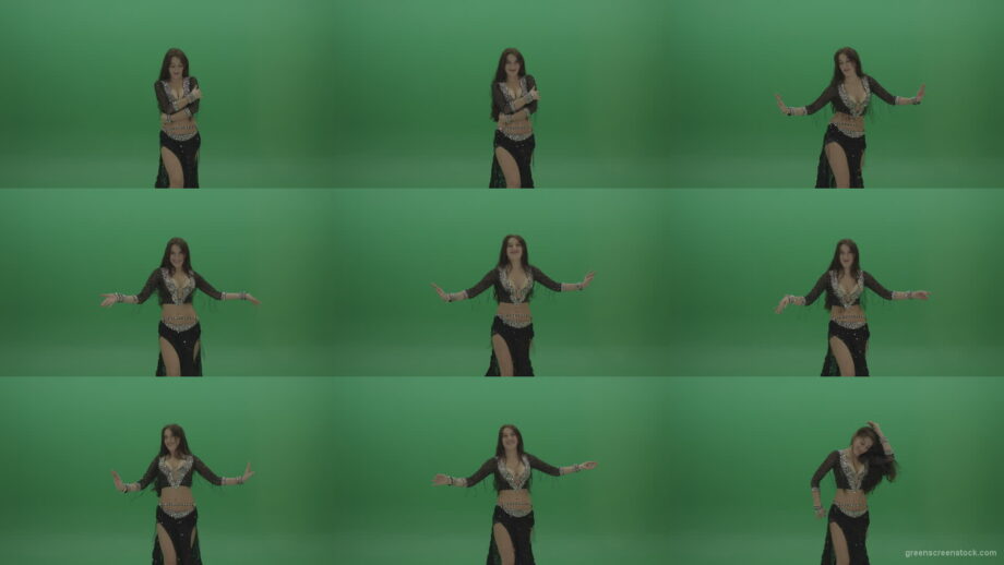 Refined-belly-dancer-in-black-wear-display-amazing-dance-moves-over-chromakey-background Green Screen Stock