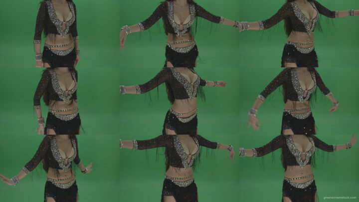 Stunning-belly-dancer-in-black-wear-display-amazing-dance-moves-over-chromakey-background Green Screen Stock