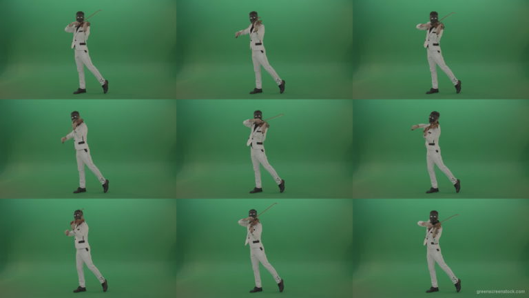 Violinist-in-a-white-jacket-and-in-a-black-mask-with-white-eyes-plays-melodically-on-the-violin Green Screen Stock