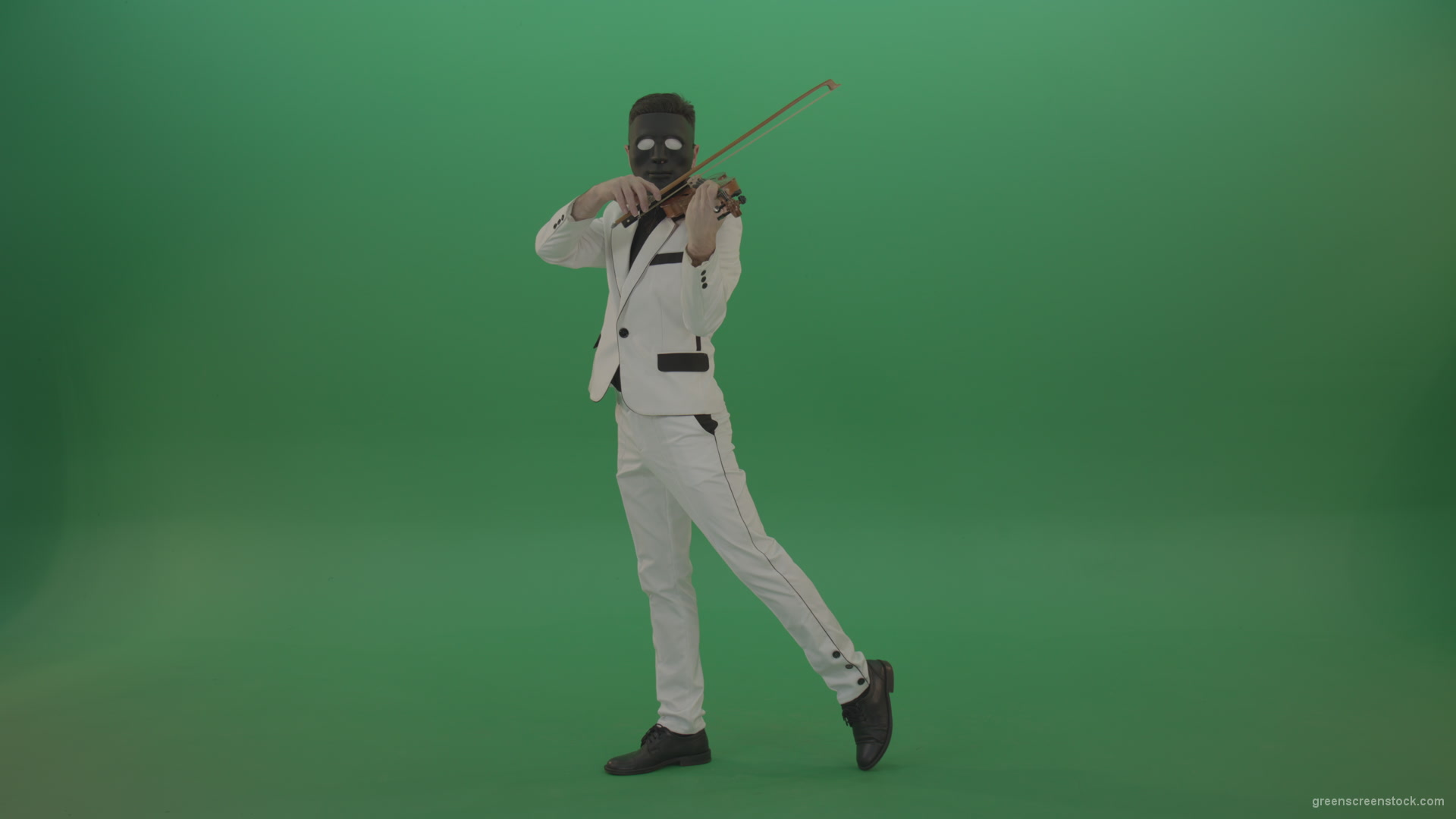 Violinist-in-a-white-jacket-and-in-a-black-mask-with-white-eyes-plays-melodically-on-the-violin_001 Green Screen Stock