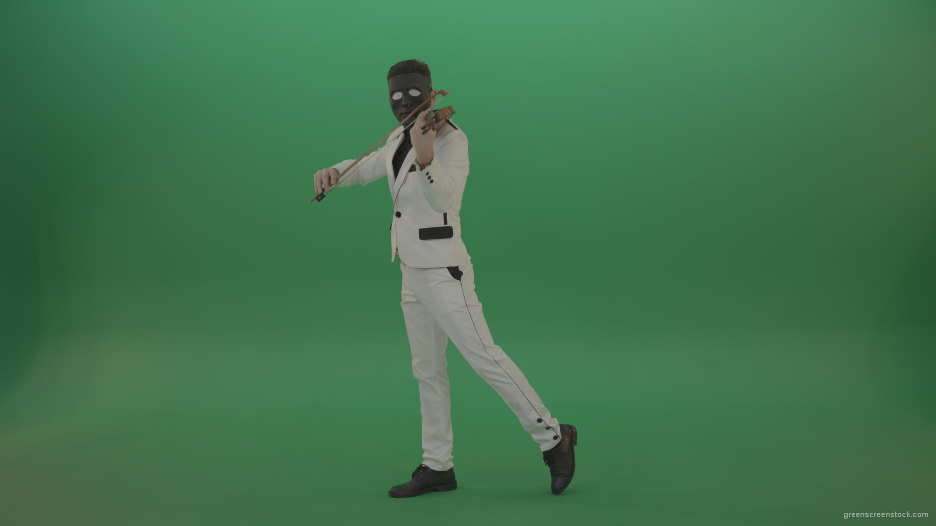 Violinist-in-a-white-jacket-and-in-a-black-mask-with-white-eyes-plays-melodically-on-the-violin_002 Green Screen Stock