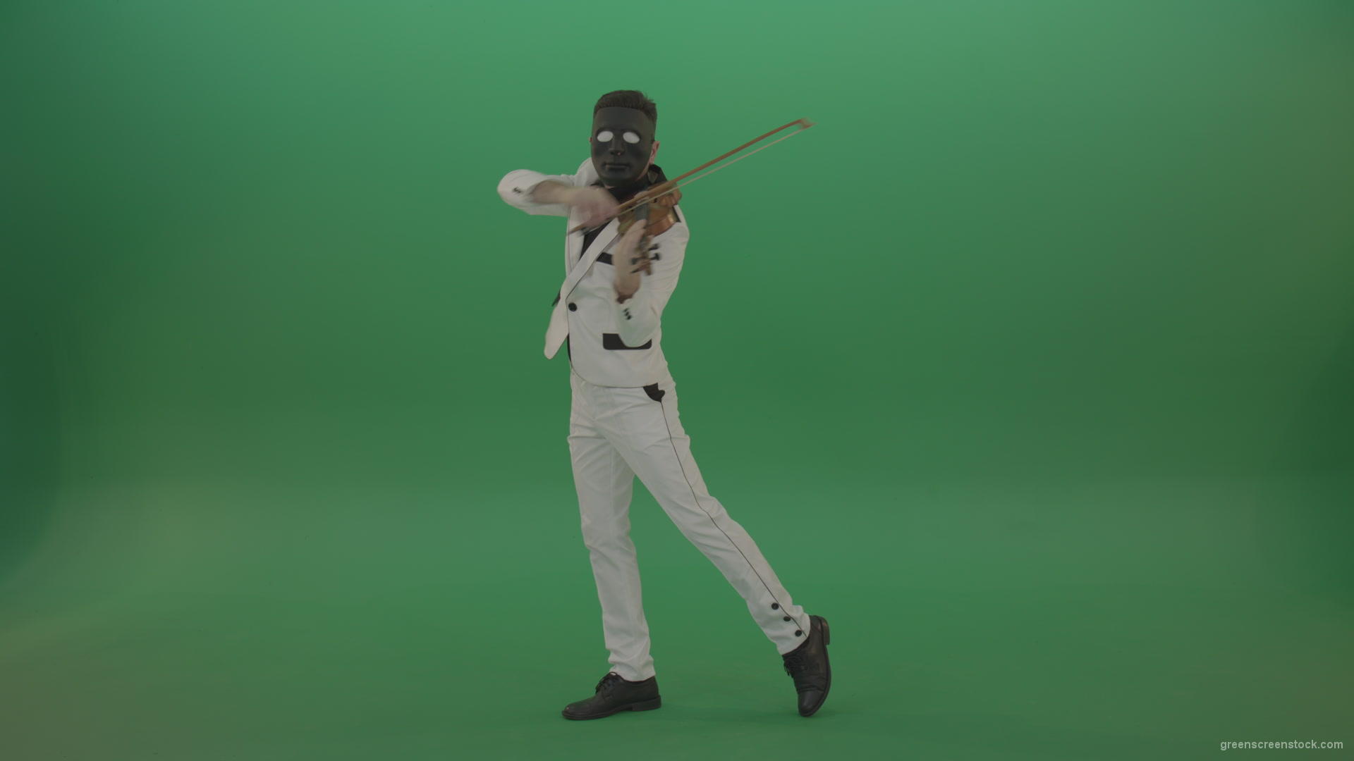 Violinist-in-a-white-jacket-and-in-a-black-mask-with-white-eyes-plays-melodically-on-the-violin_009 Green Screen Stock