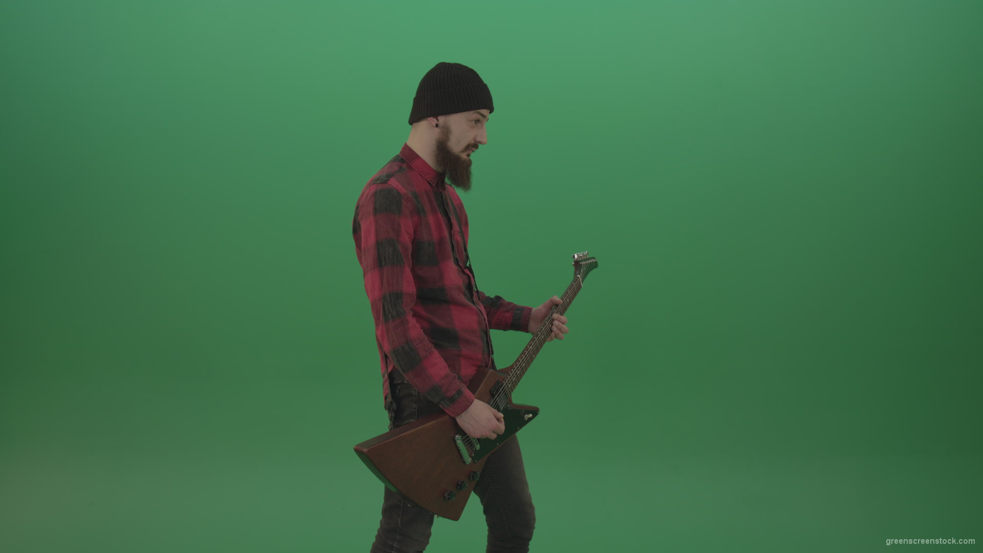 Young-man-with-beard-play-hardcore-music-on-guitar-in-side-view-on-green-screen-chromakey-background_001 Green Screen Stock