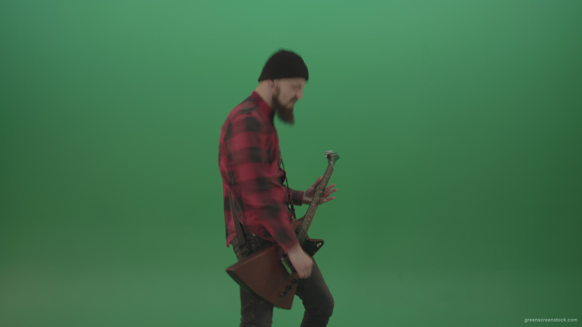 Young-man-with-beard-play-hardcore-music-on-guitar-in-side-view-on-green-screen-chromakey-background_005 Green Screen Stock