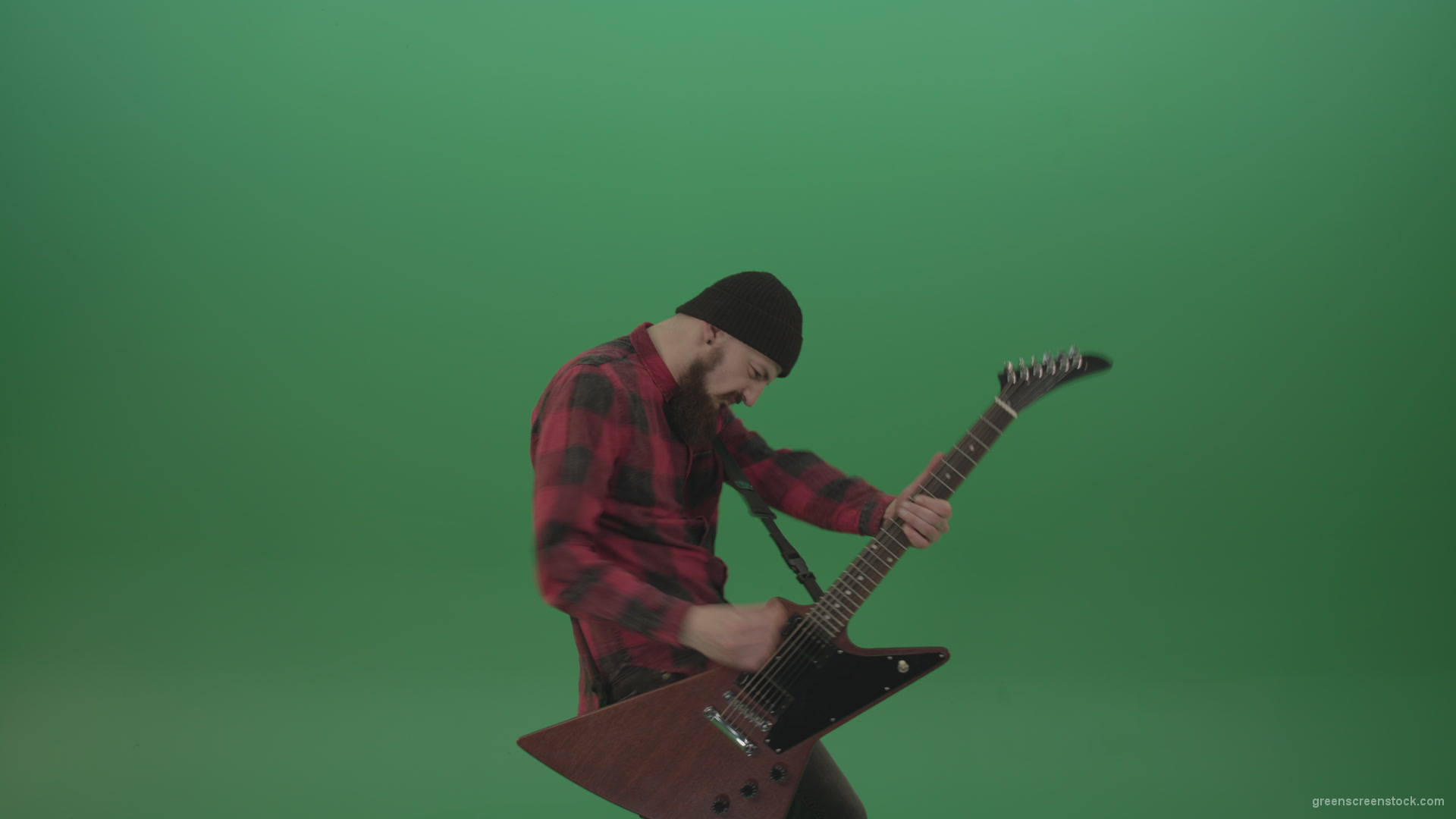 Young-man-with-beard-play-hardcore-music-on-guitar-in-side-view-on-green-screen-chromakey-background_009 Green Screen Stock