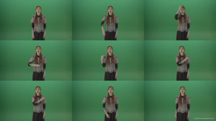 Actress-red-hair-girl-in-a-medieval-war-dress-crosses-praying-to-God-on-green-screen Green Screen Stock
